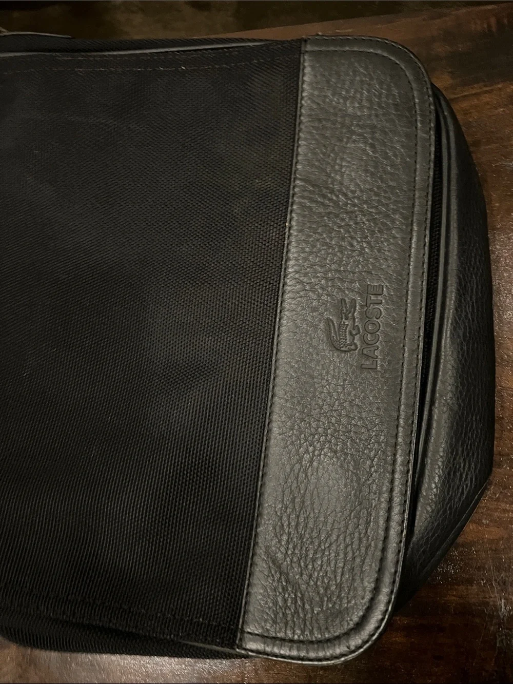 Lacoste Black Canvas Messenger Bag with Leather Trim. Lacoste shoulder/crossbody
